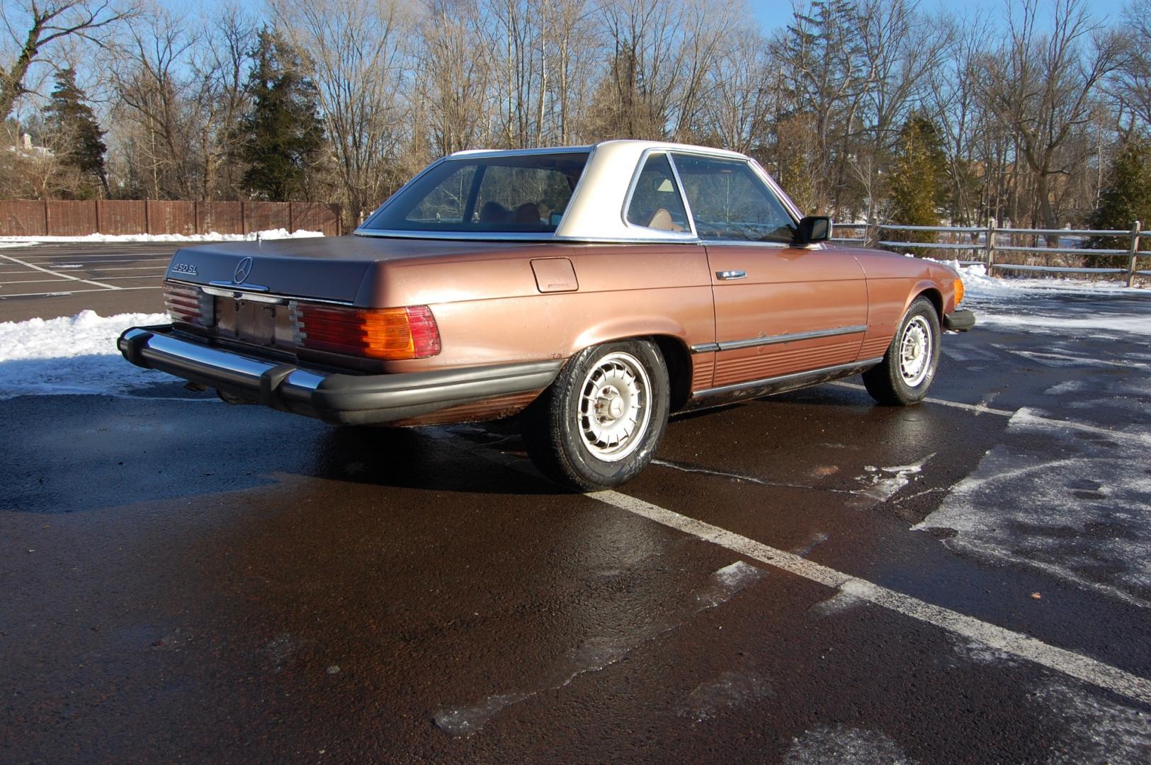 1976 Brown /Brown Leather Mercedes-Benz 450SL (10704412030) with an 4.5L V8 engine, Automatic transmission, located at 6528 Lower York Road, New Hope, PA, 18938, (215) 862-9555, 40.358707, -74.977882 - Here we have a nice 1976 Mercedes 450SL convertible with a 4.5L V8 engine putting power to the rear wheels via an automatic transmission. Some options on this vehicle include brown leather, wood trim, power windows, removable hard top, heat, A/C, AM/FM radio, cruise control, wood steering wheel, 14 - Photo#5